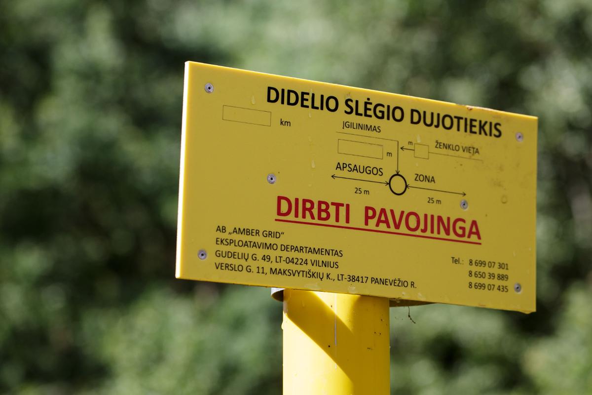 Geltonas magistralinio dujotiekio įspėjamasis ženklas apie pavojingą darbų zoną